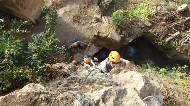 Via Ferrata Ronda - Rappelling down a waterfall in via ferrata ronda