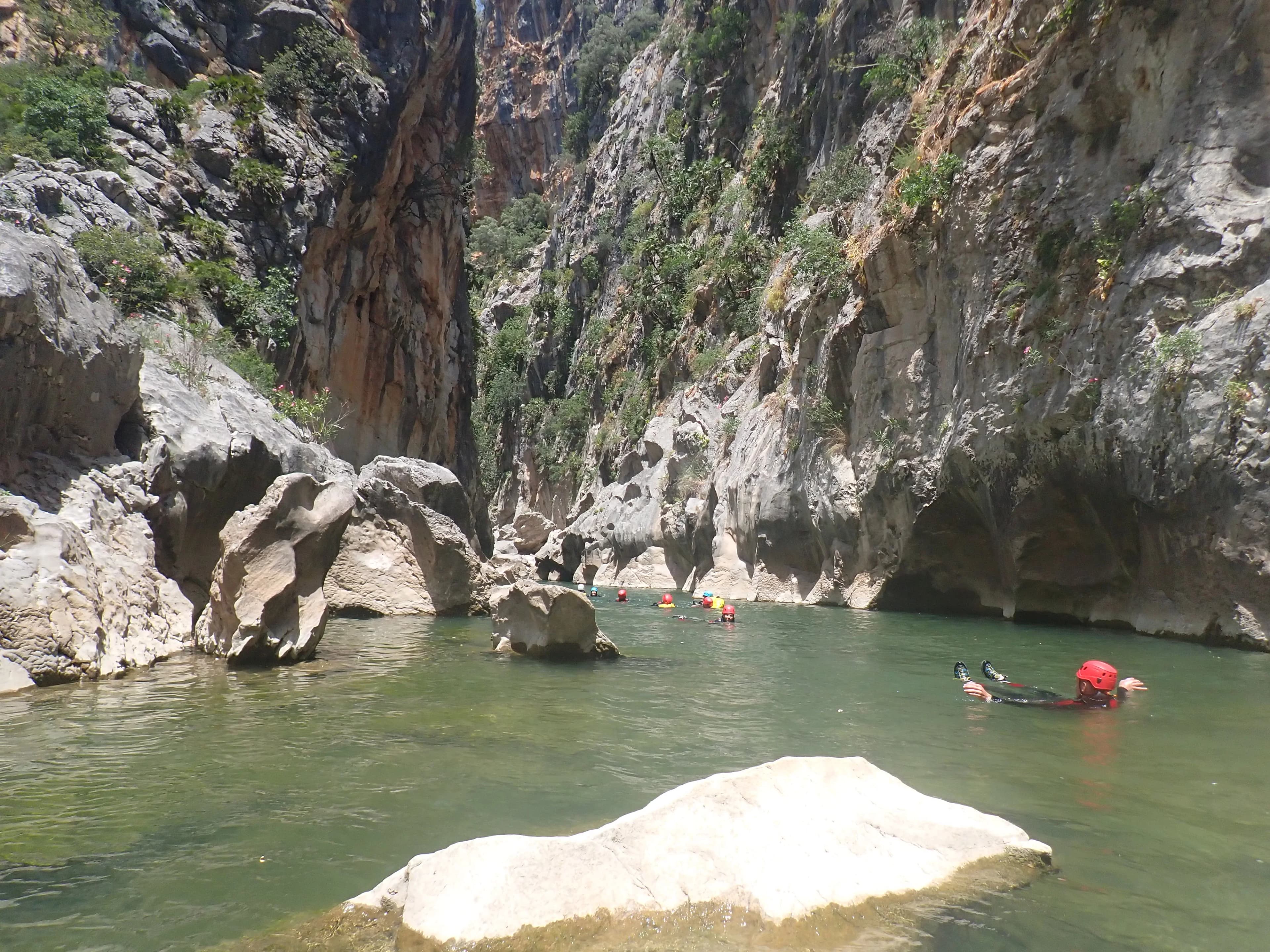 Buitreras canyon - Sliding down a natural water slide in buitreras canyon