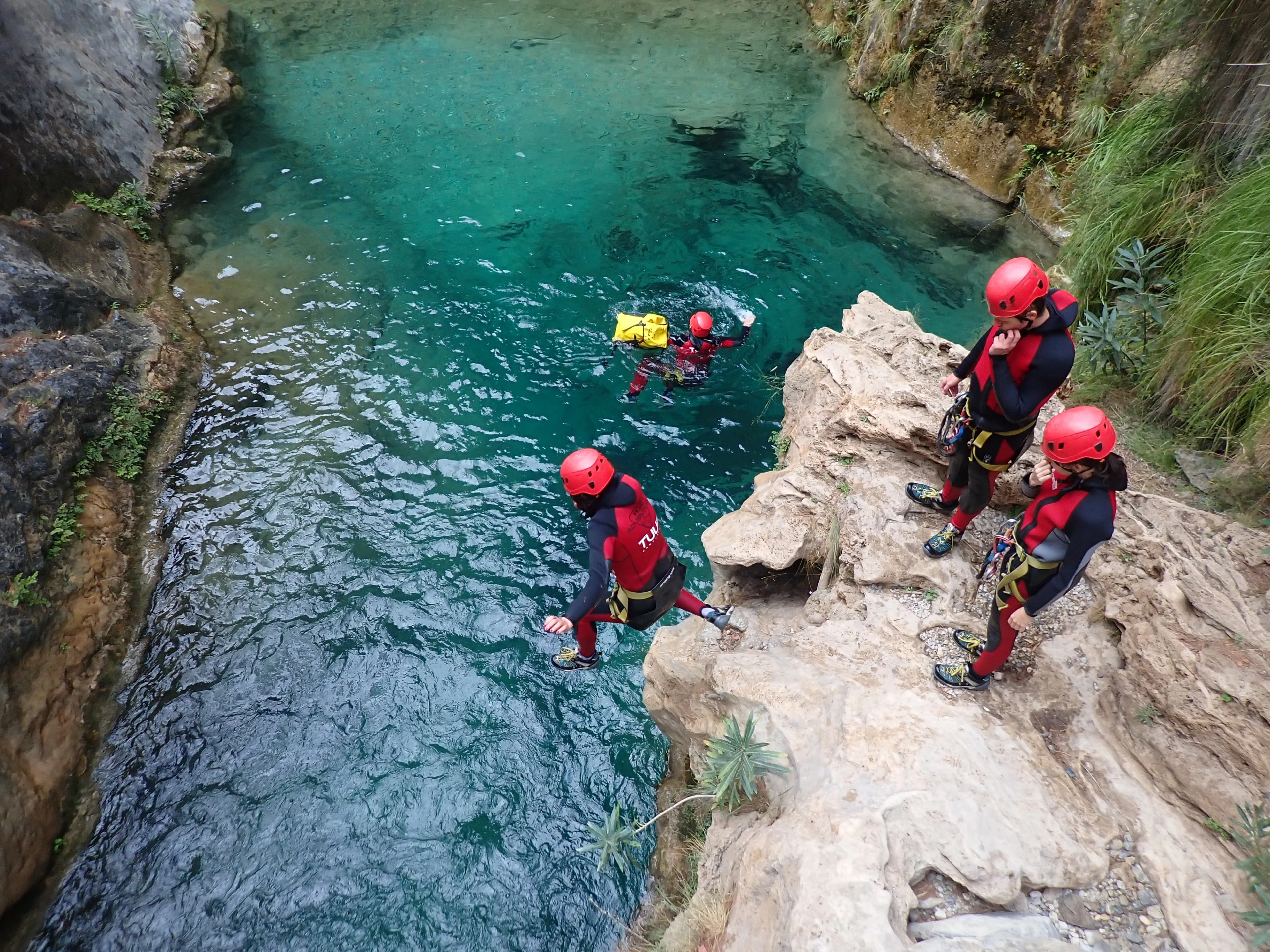 Team building group doing canyoning