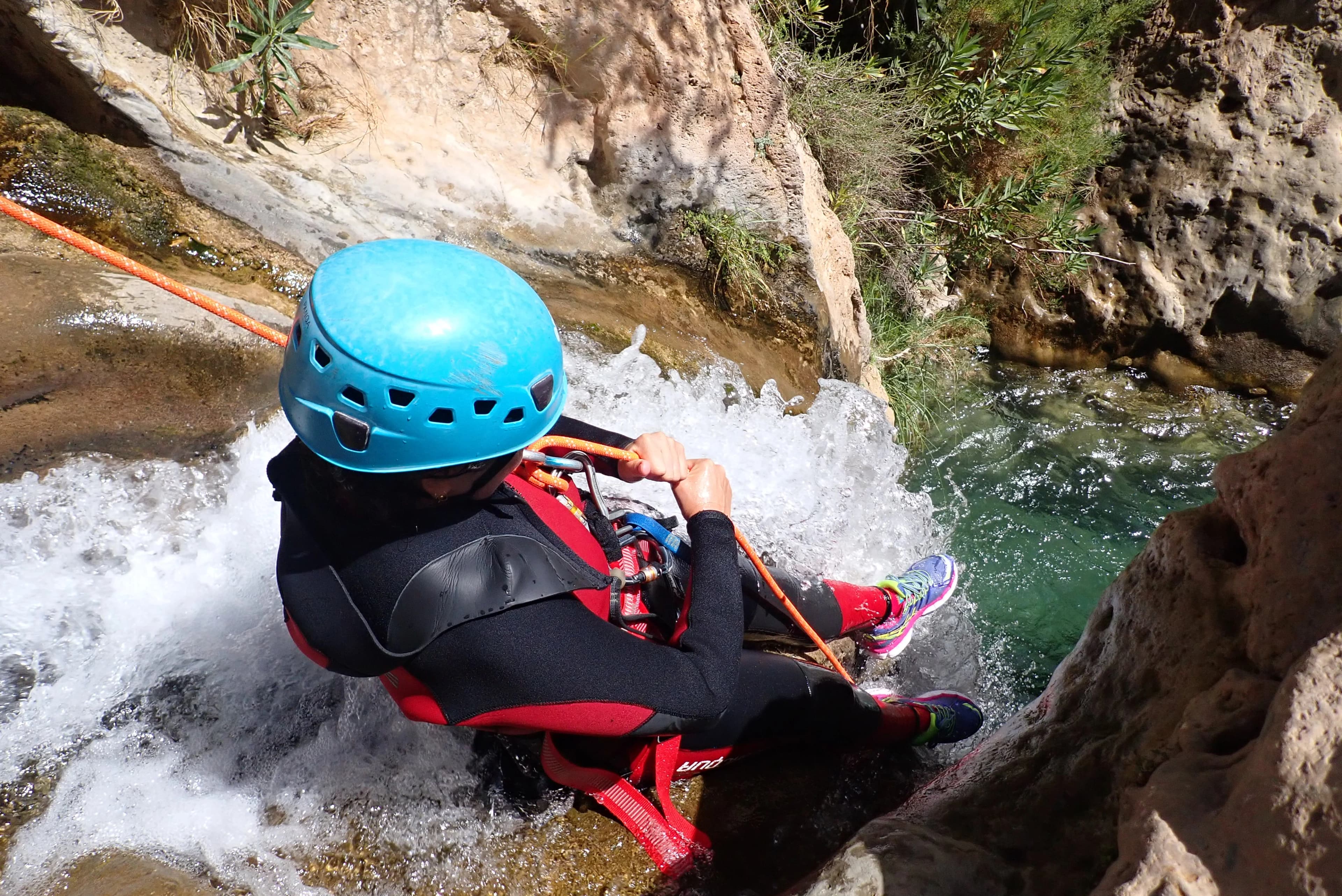 Rio Verde canyon - Sliding down a natural water slide in rio verde canyon