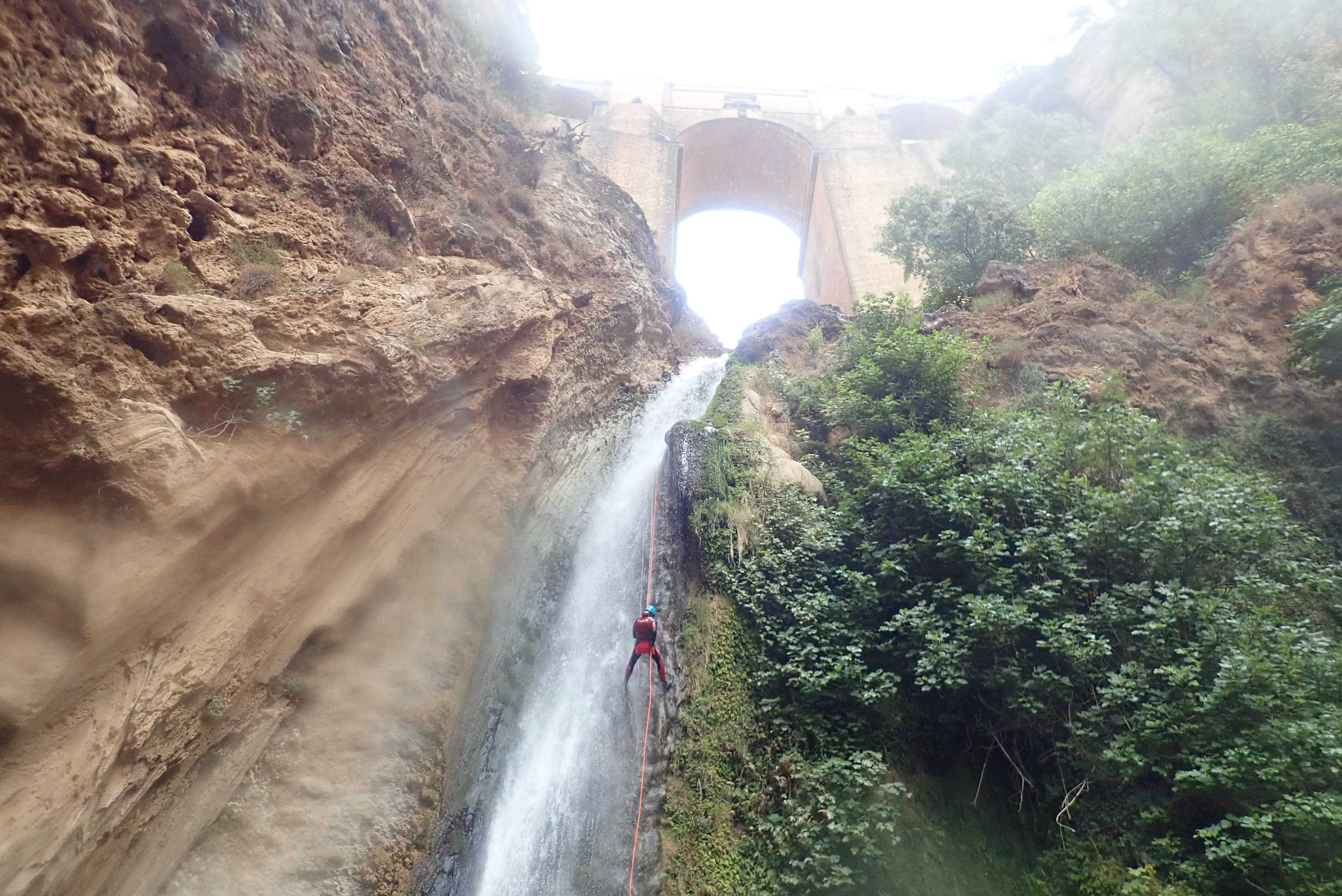 Tajo de Ronda - Rappelling down a waterfall in Ronda canyon