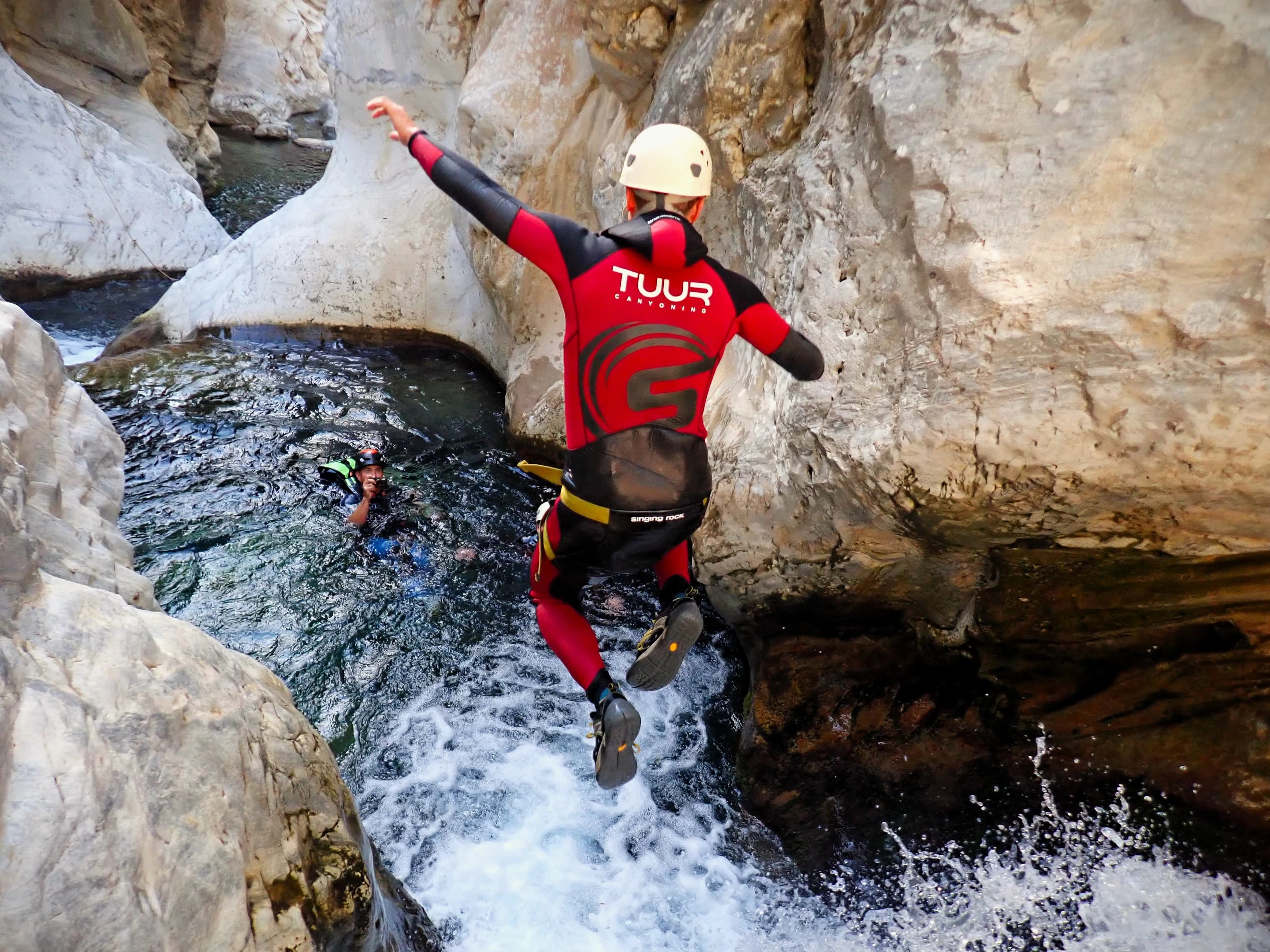 Zarzalones canyon - Jumping into a natural pool in zarzalones canyon